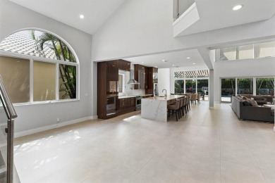 Step into this exquisitely renovated home, where modern design on Polo Club of Boca Raton in Florida - for sale on GolfHomes.com, golf home, golf lot