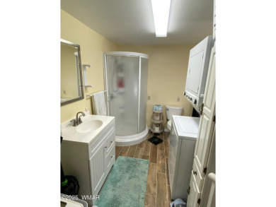 This cozy park model features 2 full bathrooms, a 40 gal hot on Juniper Ridge R.V. Golf Resort in Arizona - for sale on GolfHomes.com, golf home, golf lot