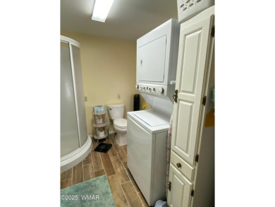 This cozy park model features 2 full bathrooms, a 40 gal hot on Juniper Ridge R.V. Golf Resort in Arizona - for sale on GolfHomes.com, golf home, golf lot