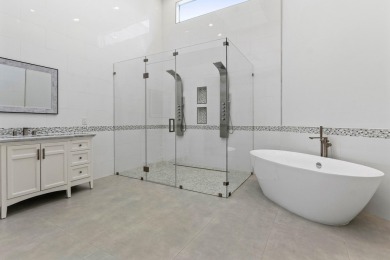 Step into this exquisitely renovated home, where modern design on Polo Club of Boca Raton in Florida - for sale on GolfHomes.com, golf home, golf lot