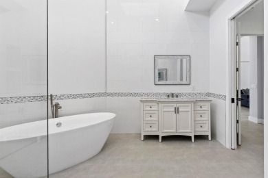 Step into this exquisitely renovated home, where modern design on Polo Club of Boca Raton in Florida - for sale on GolfHomes.com, golf home, golf lot