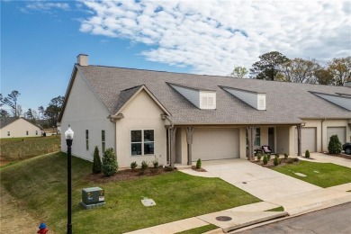 Experience the epitome of luxurious, age-targeted living at on Grand National Golf Course in Alabama - for sale on GolfHomes.com, golf home, golf lot