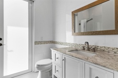 Step into this exquisitely renovated home, where modern design on Polo Club of Boca Raton in Florida - for sale on GolfHomes.com, golf home, golf lot
