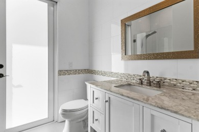 Step into this exquisitely renovated home, where modern design on Polo Club of Boca Raton in Florida - for sale on GolfHomes.com, golf home, golf lot