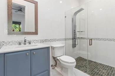 Step into this exquisitely renovated home, where modern design on Polo Club of Boca Raton in Florida - for sale on GolfHomes.com, golf home, golf lot
