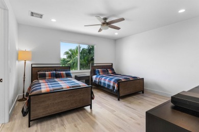 Step into this exquisitely renovated home, where modern design on Polo Club of Boca Raton in Florida - for sale on GolfHomes.com, golf home, golf lot