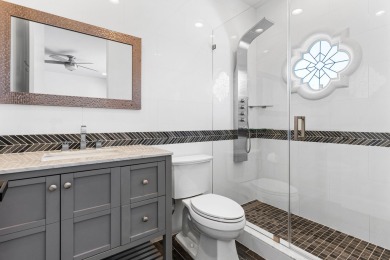 Step into this exquisitely renovated home, where modern design on Polo Club of Boca Raton in Florida - for sale on GolfHomes.com, golf home, golf lot
