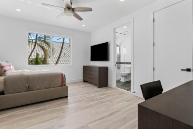 Step into this exquisitely renovated home, where modern design on Polo Club of Boca Raton in Florida - for sale on GolfHomes.com, golf home, golf lot