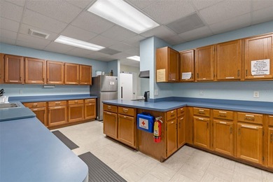 One or more photo(s) has been virtually staged. Move in Ready on Bay Tree Golf Course in Florida - for sale on GolfHomes.com, golf home, golf lot