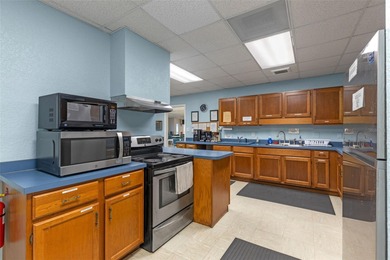 One or more photo(s) has been virtually staged. Move in Ready on Bay Tree Golf Course in Florida - for sale on GolfHomes.com, golf home, golf lot