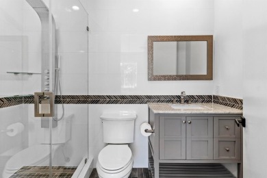 Step into this exquisitely renovated home, where modern design on Polo Club of Boca Raton in Florida - for sale on GolfHomes.com, golf home, golf lot