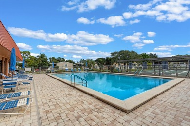 One or more photo(s) has been virtually staged. Move in Ready on Bay Tree Golf Course in Florida - for sale on GolfHomes.com, golf home, golf lot