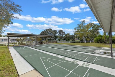One or more photo(s) has been virtually staged. Move in Ready on Bay Tree Golf Course in Florida - for sale on GolfHomes.com, golf home, golf lot