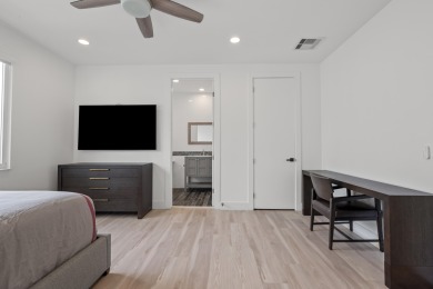 Step into this exquisitely renovated home, where modern design on Polo Club of Boca Raton in Florida - for sale on GolfHomes.com, golf home, golf lot