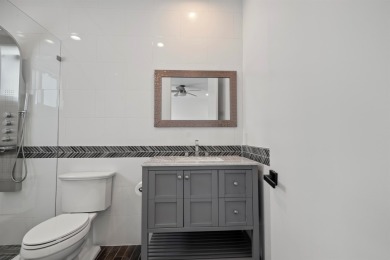 Step into this exquisitely renovated home, where modern design on Polo Club of Boca Raton in Florida - for sale on GolfHomes.com, golf home, golf lot