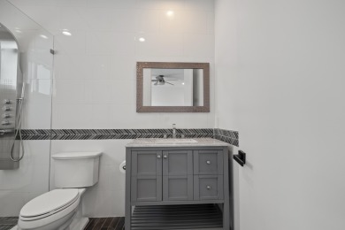 Step into this exquisitely renovated home, where modern design on Polo Club of Boca Raton in Florida - for sale on GolfHomes.com, golf home, golf lot