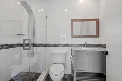 Step into this exquisitely renovated home, where modern design on Polo Club of Boca Raton in Florida - for sale on GolfHomes.com, golf home, golf lot