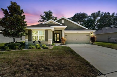 Wake up every day to sweeping golf course views and the relaxed on Meadow Oaks Golf and Country Club in Florida - for sale on GolfHomes.com, golf home, golf lot