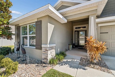 Wake up every day to sweeping golf course views and the relaxed on Meadow Oaks Golf and Country Club in Florida - for sale on GolfHomes.com, golf home, golf lot