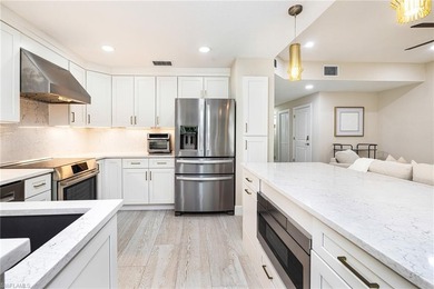 SELLER WILL PAY ONE YEAR OF WEST BAY CLUB AND TURTLE POINT HOA on West Bay Beach and Golf Club in Florida - for sale on GolfHomes.com, golf home, golf lot