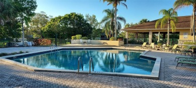 Lovely condo in prestigious Meadowood Country Club overlooking on Meadowood Golf and Tennis Club in Florida - for sale on GolfHomes.com, golf home, golf lot