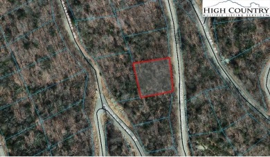 This buildable third acre lot is located close to Buckeye Lake on Beech Mountain Club in North Carolina - for sale on GolfHomes.com, golf home, golf lot