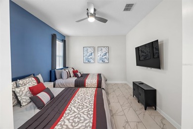 Beautifully furnished and very well maintained 7-bedroom on ChampionsGate Golf Resort in Florida - for sale on GolfHomes.com, golf home, golf lot