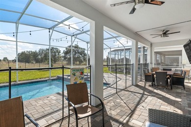 Beautifully furnished and very well maintained 7-bedroom on ChampionsGate Golf Resort in Florida - for sale on GolfHomes.com, golf home, golf lot