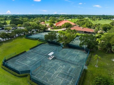 Lovely condo in prestigious Meadowood Country Club overlooking on Meadowood Golf and Tennis Club in Florida - for sale on GolfHomes.com, golf home, golf lot