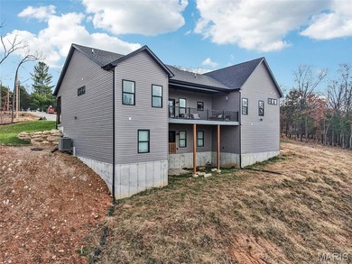 Who wants to be the lucky one to own this STUNNING Home?? on Raintree Country Club in Missouri - for sale on GolfHomes.com, golf home, golf lot
