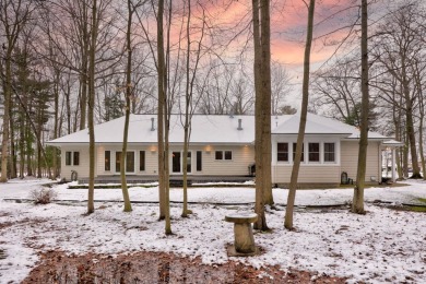 Nestled in the tranquil embrace of Timber Point Estates, 9102 on The Timbers Golf Club in Michigan - for sale on GolfHomes.com, golf home, golf lot