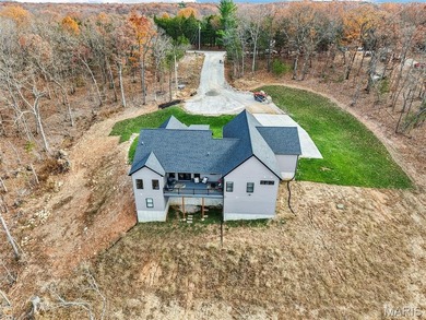 Who wants to be the lucky one to own this STUNNING Home?? on Raintree Country Club in Missouri - for sale on GolfHomes.com, golf home, golf lot