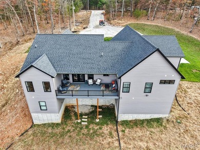Who wants to be the lucky one to own this STUNNING Home?? on Raintree Country Club in Missouri - for sale on GolfHomes.com, golf home, golf lot