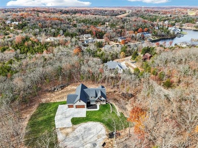 Who wants to be the lucky one to own this STUNNING Home?? on Raintree Country Club in Missouri - for sale on GolfHomes.com, golf home, golf lot