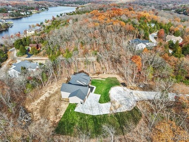Who wants to be the lucky one to own this STUNNING Home?? on Raintree Country Club in Missouri - for sale on GolfHomes.com, golf home, golf lot