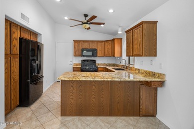 Welcome home to this beautifully maintained 2-bedroom + office on Arizona Traditions Golf Club in Arizona - for sale on GolfHomes.com, golf home, golf lot