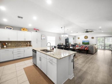Welcome to this beautifully maintained 3-bedroom, 2-bath CBS on Spanish Lakes Country Club in Florida - for sale on GolfHomes.com, golf home, golf lot