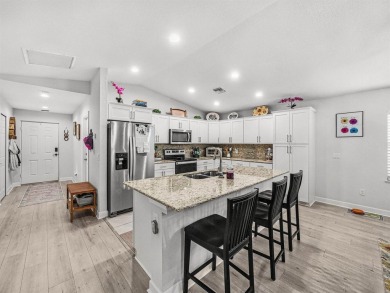 Welcome to this beautifully maintained 3-bedroom, 2-bath CBS on Spanish Lakes Country Club in Florida - for sale on GolfHomes.com, golf home, golf lot