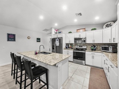 Welcome to this beautifully maintained 3-bedroom, 2-bath CBS on Spanish Lakes Country Club in Florida - for sale on GolfHomes.com, golf home, golf lot