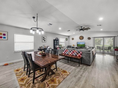 Welcome to this beautifully maintained 3-bedroom, 2-bath CBS on Spanish Lakes Country Club in Florida - for sale on GolfHomes.com, golf home, golf lot