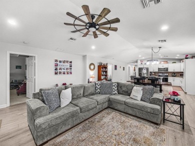Welcome to this beautifully maintained 3-bedroom, 2-bath CBS on Spanish Lakes Country Club in Florida - for sale on GolfHomes.com, golf home, golf lot