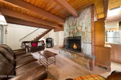 Set on a beautiful 0.52-acre lot surrounded by towering pines on Pinetop Lakes Country Club in Arizona - for sale on GolfHomes.com, golf home, golf lot