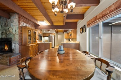 Set on a beautiful 0.52-acre lot surrounded by towering pines on Pinetop Lakes Country Club in Arizona - for sale on GolfHomes.com, golf home, golf lot