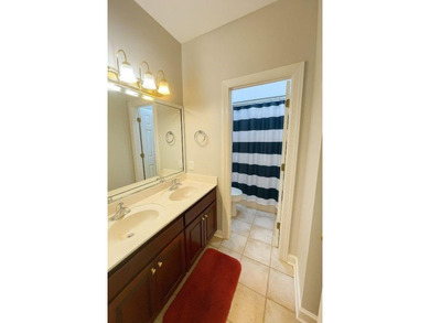 Welcome to 724 Highland Road - where elegant living meets modern on Moores Mill Golf Club in Alabama - for sale on GolfHomes.com, golf home, golf lot