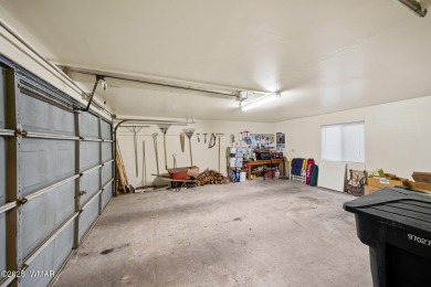 Set on a beautiful 0.52-acre lot surrounded by towering pines on Pinetop Lakes Country Club in Arizona - for sale on GolfHomes.com, golf home, golf lot