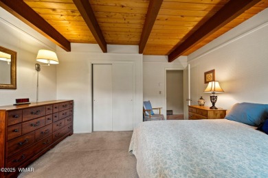Set on a beautiful 0.52-acre lot surrounded by towering pines on Pinetop Lakes Country Club in Arizona - for sale on GolfHomes.com, golf home, golf lot