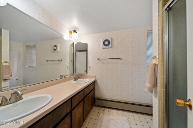 Set on a beautiful 0.52-acre lot surrounded by towering pines on Pinetop Lakes Country Club in Arizona - for sale on GolfHomes.com, golf home, golf lot