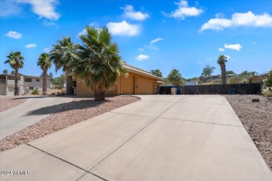 Nestled in a serene neighborhood and backing to a picturesque on Desert Canyon Golf Club in Arizona - for sale on GolfHomes.com, golf home, golf lot