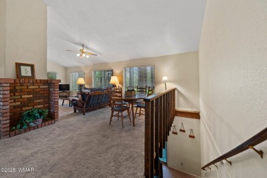 Set on a beautiful 0.52-acre lot surrounded by towering pines on Pinetop Lakes Country Club in Arizona - for sale on GolfHomes.com, golf home, golf lot
