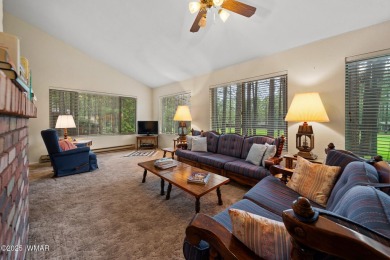 Set on a beautiful 0.52-acre lot surrounded by towering pines on Pinetop Lakes Country Club in Arizona - for sale on GolfHomes.com, golf home, golf lot
